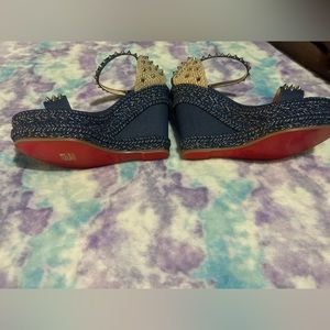 The item is new never used good condition it is Christian Louboutin Paris